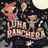 Illustration of two singing dogs under a full moon with desert plants and animals, featuring Luna Ranchera title.