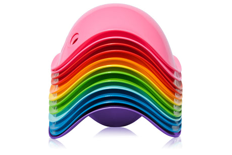 Stack of colorful Bilibo toys in various bright hues, perfect for imaginative and active play for kids ages 2-8.