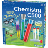 Chemistry C500 STEM experiment kit with test tubes, safety goggles, pipette, and colorful chemical reactions for ages 10 and up