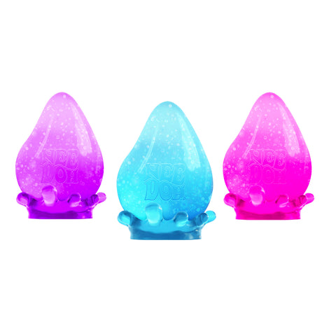 NeeDoh Dream Drop squishy fidget toys in purple, blue, and pink with sparkles and included stands.