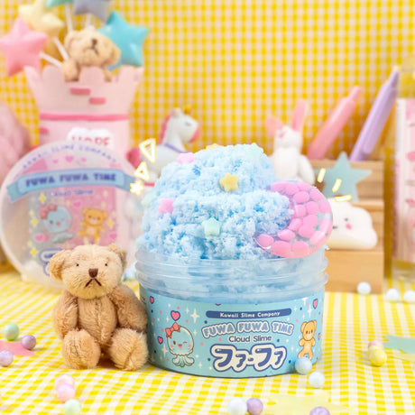 Fuwa Fuwa Time Icee Cloud Slime in blue with moon charm, stars, and teddy bear on yellow checkered background.