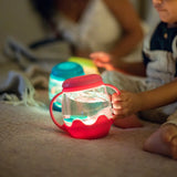 Mini Sensory Jar | Pink glowing as a child explores it