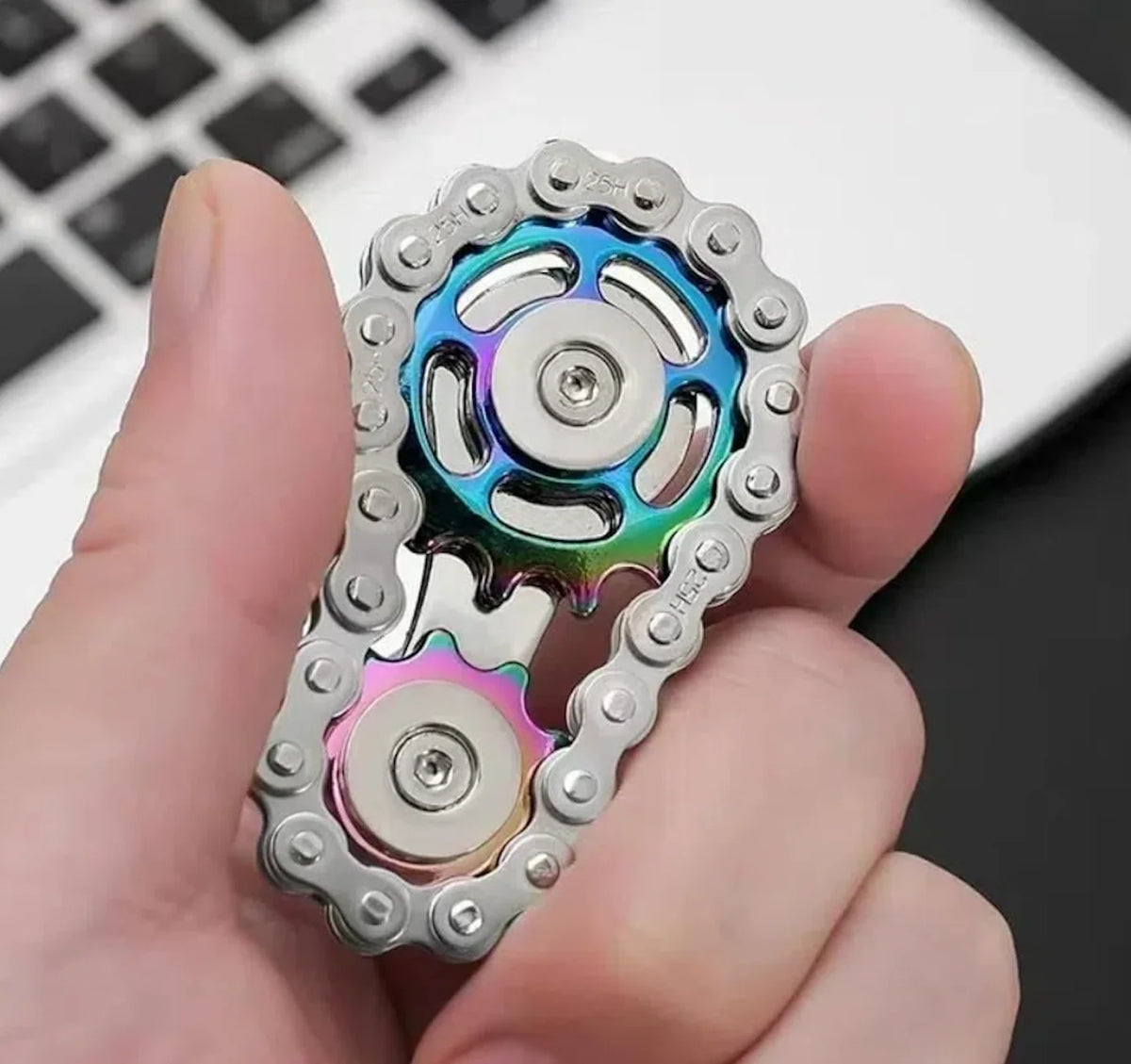 Gear Spinner with colorful interlocking gears held in a hand