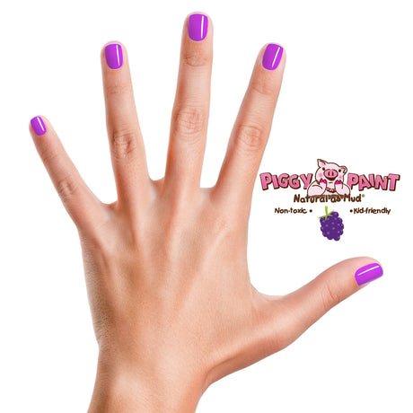 Hand with nails painted in purple using Nail Polish Scented Grouchy Grape featuring a grape scent and non-toxic formula.