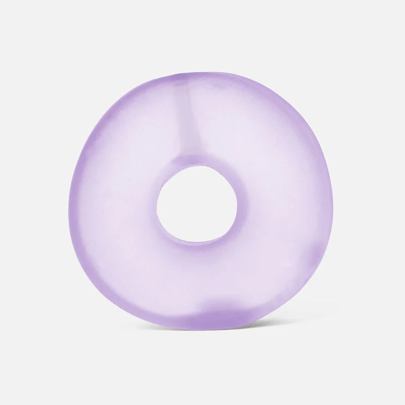 Soft lavender Gump Loop stress toy with a squishy memory gel center designed for fidgeting and stress relief.