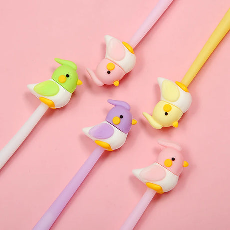 Colorful Bird Pet Gel Pen set with fine tip and assorted styles on a pink background for writing and illustration.