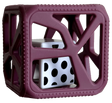 Chew Cube | Purple teething rattle with multi-textured surfaces and black and white polka dot center cube for babies.
