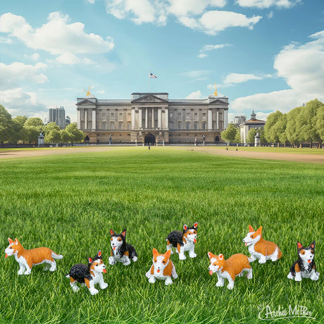 Itty Bitty Corgis soft vinyl miniature corgis in two poses and colors displayed on grass in front of a grand building.