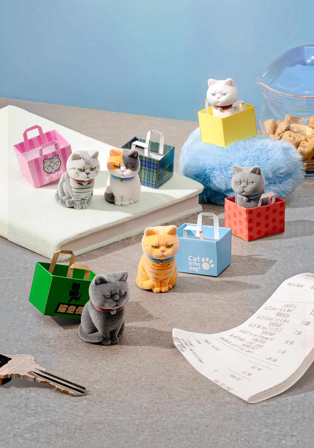 Flocked Cats in Paper Bags Blind Box with adorable cat figures in colorful paper bags
