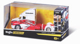 Die-cast metal Mack Anthem big rig model with custom red and white paint in a clear display box for ages 8 and up