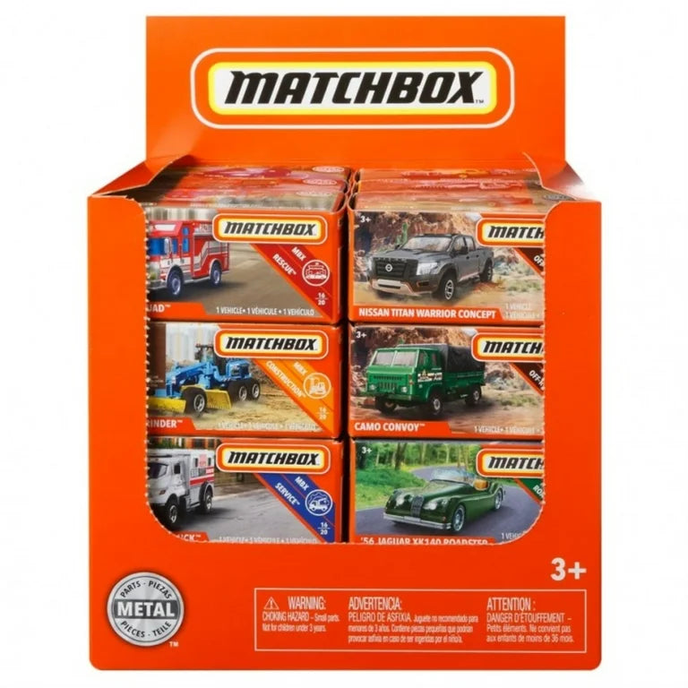 Display box of Matchbox vehicles featuring six different miniature die-cast cars with detailed designs and real rolling wheels