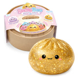 Lucky Bao Dumpling golden glitter dumpling toy with a smiling face and colorful packaging