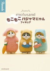Illustration of three colorful fuzzy cat characters with Japanese text above them