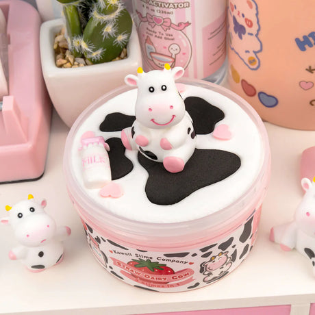 Straw-Dairy Cow 2 Slimes in 1 with cute cow topper and glossy base perfect for playful, chewy slime fans.