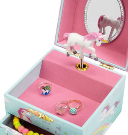Open pastel unicorn jewelry box with mirror and dancing unicorn figurine surrounded by colorful bracelets and beads
