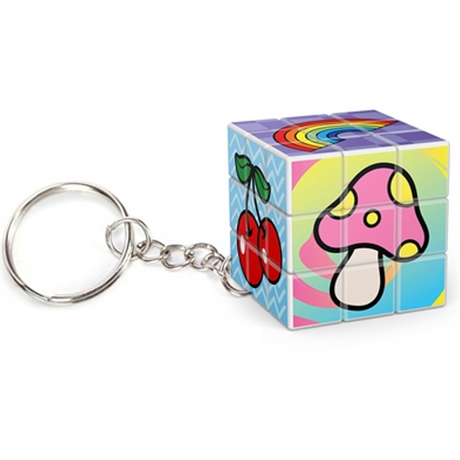 Cube-Dini Mini: Totally 90's Keychain featuring colorful 90's inspired icons like a rainbow, mushrooms, and cherries.