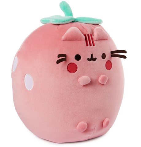 Pusheen Strawberry plush toy in soft pink with embroidered seeds and green leafy stem, rosy cheeks, and a cute cat face.