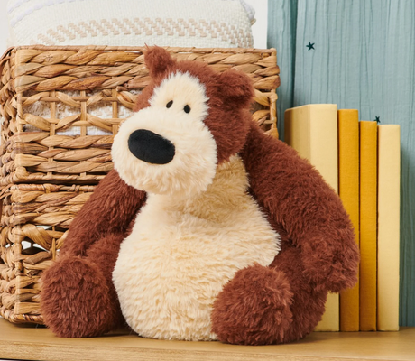 Teddy Bear Goober plush with soft chocolate and vanilla tones, squishy belly, and a friendly, hunched pose sitting upright.