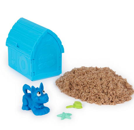 Kinetic Sand Doggie Dig set with blue dog tool, beige kinetic sand, treasures, and foldable doghouse container.