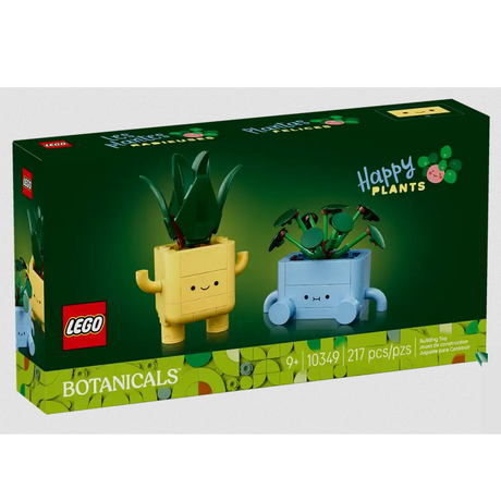 Box of Botanicals Happy Plants LEGO set featuring a yellow dracaena and blue pilea plant pots with faces.