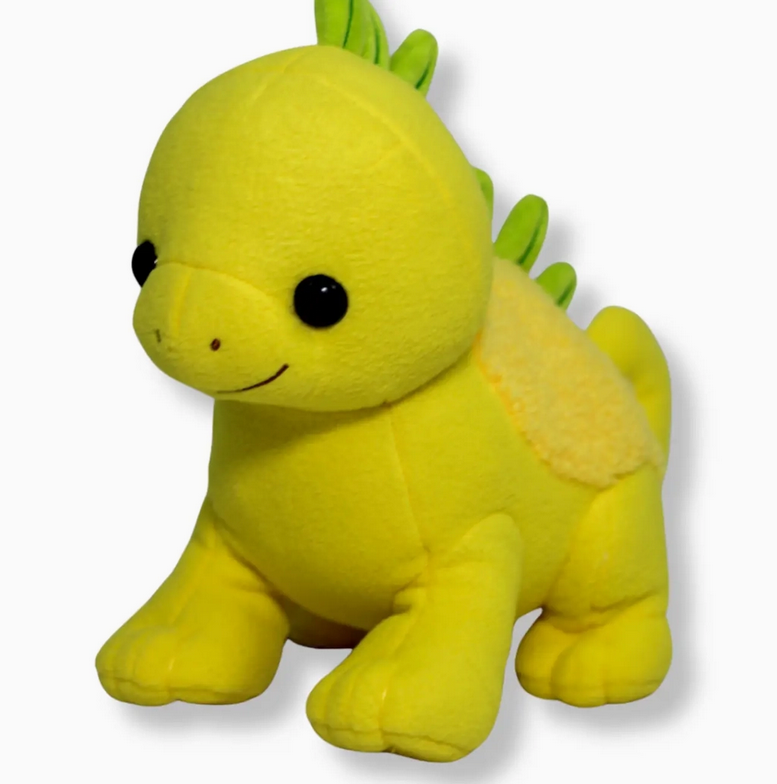 Soft yellow plush dinosaur with green fabric spikes and a fuzzy patch on its back against white background