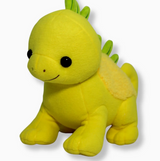 Soft yellow plush dinosaur with green fabric spikes and a fuzzy patch on its back against white background