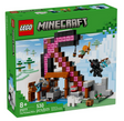LEGO Minecraft set featuring a pixelated pickaxe, two characters, a spider, and mine-themed accessories in a snowy landscape background