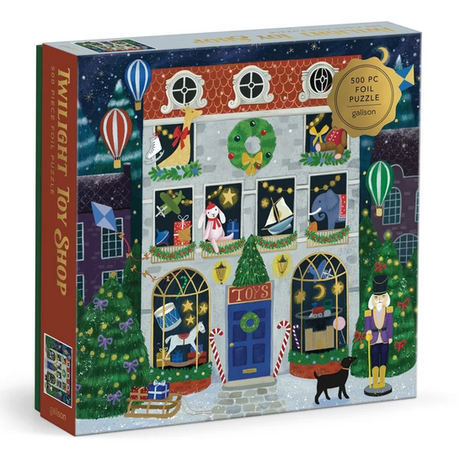 500pc Twilight Toy Shop Foil Puzzle featuring a festive toy shop scene with snowy windows and holiday decorations