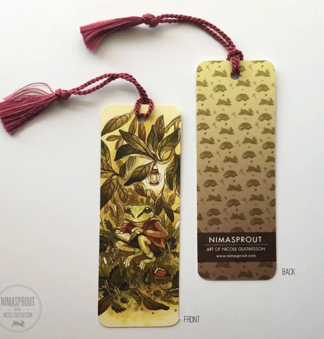 Bookmark Reading Treefrog with a Pacific Tree Frog reading under leaves and a burgundy tassel, professionally printed.