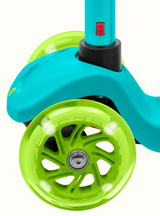 Chipmunk Plus Kids' Kick Scooter in Turquoise with glowing green three wheels for safety and fun rides.