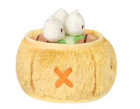 Dim Sum Mini plush toy featuring three soft dumplings in a cozy yellow basket, perfect for all ages.
