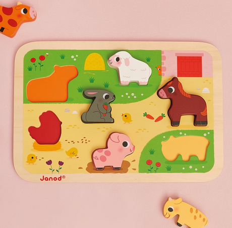 Chunky Barnyard Wooden Puzzle featuring colorful farm animals including cow, rabbit, horse, and pig in a wooden board puzzle.