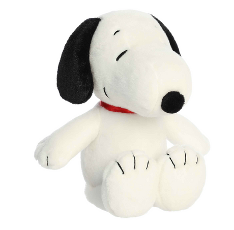 Snoopy Floppy Legs plush in soft white fabric with black ears and stitched details, sitting with floppy legs and red collar.