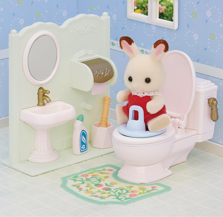 Toilet Set with toilet, sink, cleaning products, potty attachment, and toilet mat in a miniature bathroom scene.