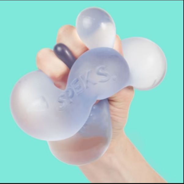 Hand squeezing translucent Speks. Gump Jumbo Dew stress ball with gooey gel inside against blue background.