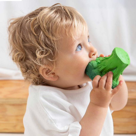 Baby chewing on Natural Teether | Brucy the Broccoli made of soft, safe natural rubber for soothing gums.