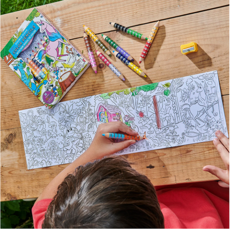 Child coloring a detailed fold-out mini mural with shiny striped pencils from Colored Pencils & Mini Mural | Magical Creatures set.