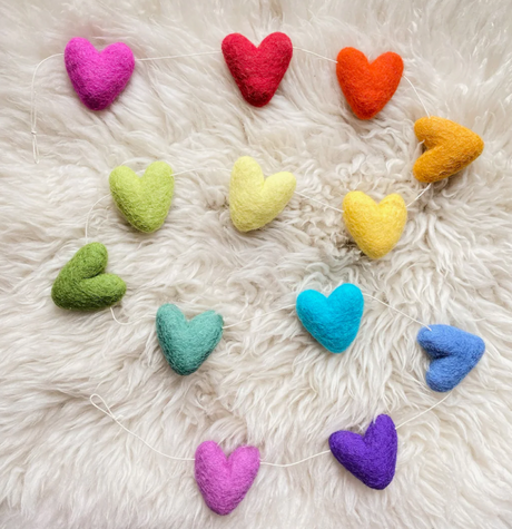Felt Garland | Rainbow Hearts featuring 13 colorful felt hearts on white cotton string, handmade from New Zealand wool.