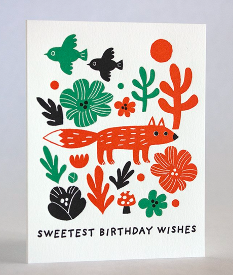 Fox and Flowers Birthday Card featuring a red fox, colorful flowers, and birds on recycled white paper.