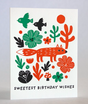 Fox and Flowers Birthday Card featuring a red fox, colorful flowers, and birds on recycled white paper.
