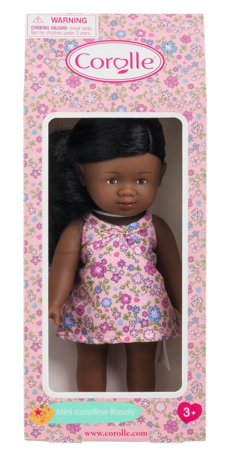 Mini Corolline Rosaly doll with dark hair in floral dress, 8-inch petite vinyl doll for ages 3 and up.