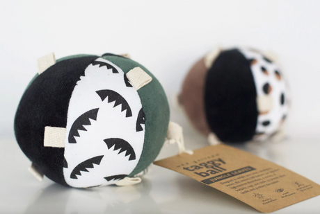 Organic Taggy Ball with Rattle | Jungle Leaves sensory toy with organic cotton and high-contrast jungle leaf patterns for babies.