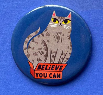 Believe You Can Cat Magnet with a grey cat illustration on a blue background, made with recycled paper and steel.