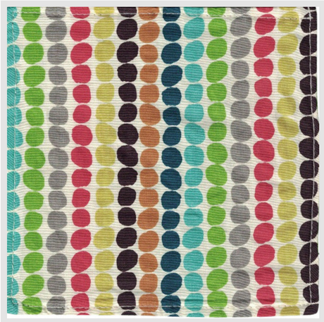 Baby Paper | Organic Pebbles showing colorful organic fabric with pebble pattern, safe for babies to grasp and play.