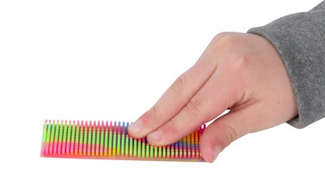 Hand pressing colorful textured Zen Strips | Multicolor Silicone 2pk for sensory calming and focus.