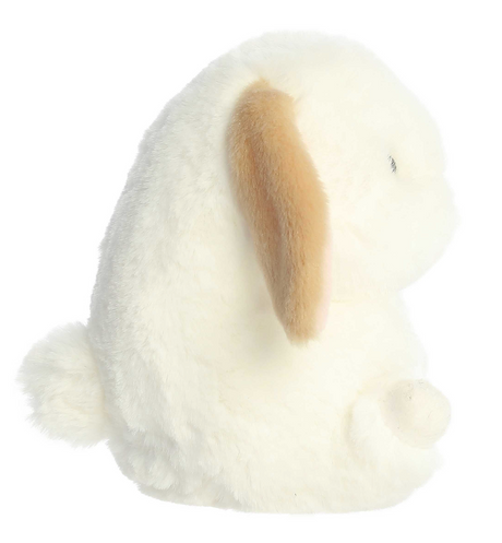 Side view of the soft plush Rolly Bunny Bouncy with floppy ears and a round cuddly shape.