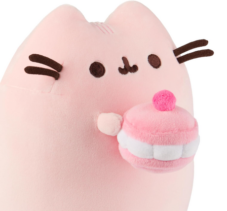 Pusheen Cherry Macaron plush features a soft pink cat holding a pink-and-white cherry macaron, super squishy and adorable.