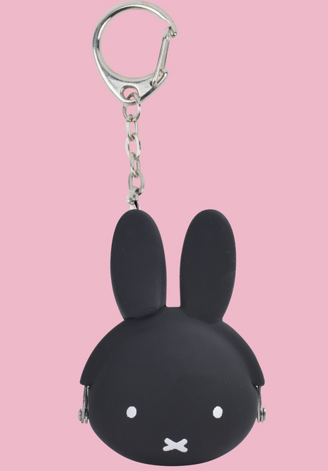mimi POCHI BABY Miffy Pouch Black silicone coin case with bunny face and keychain attachment on pink background