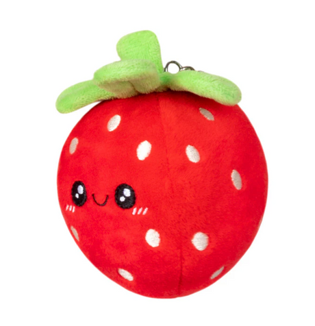 Strawberry Micro plush with a smiling face, green leaves, and a metal clip for ages 3 and up.
