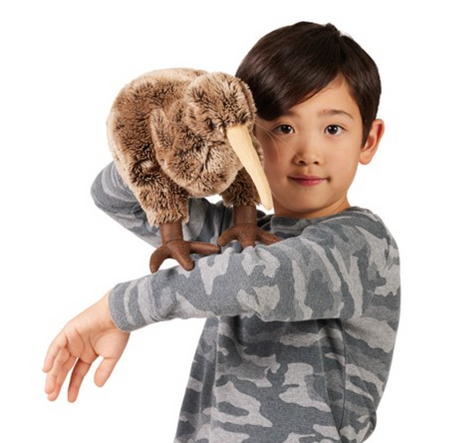 Child playing with a plush Kiwi Puppet featuring velour accents and lifelike movement on head and feet pockets.